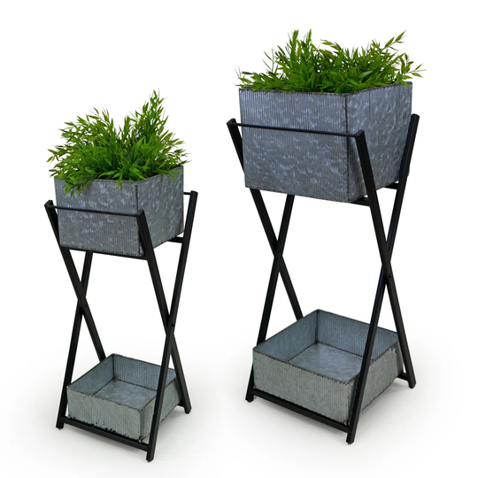 Set of 2 metal planters on a black stand