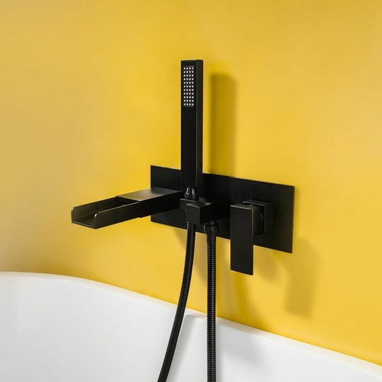 Sophisticated drop-in tub faucet in solid black with black handshower