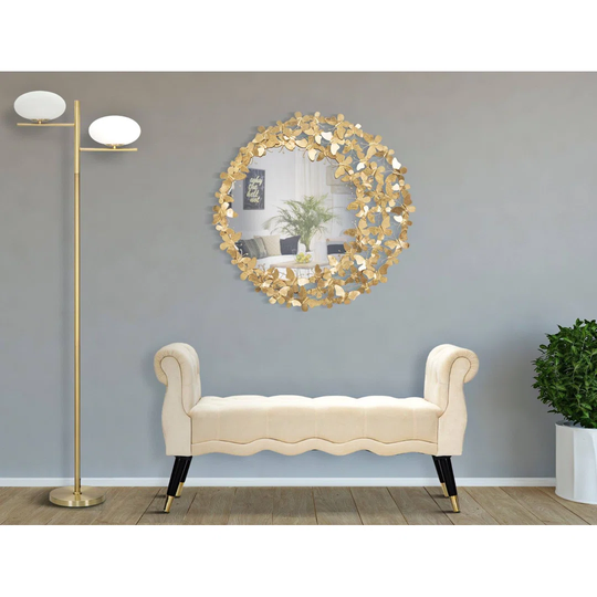 Makhi Round Metal Framed Wall Mounted Accent Mirror in Gold