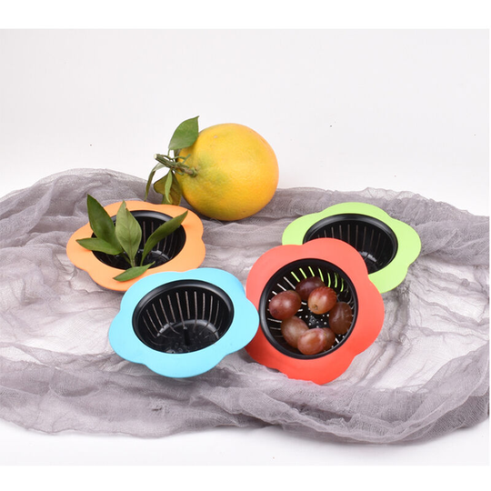 Set of 4 plastic sink strainers for cleaning sink drains.