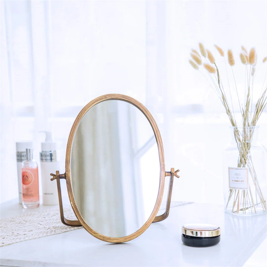 Kosinski Oval Metal Framed Freestanding Makeup Mirror in Gold