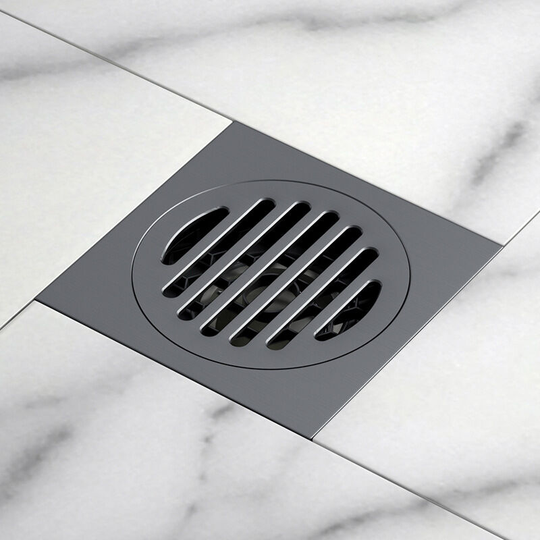 Stainless steel floor drain with removable lid and hair filter to prevent odors from entering through the drain, matt black.