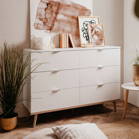 Chest of drawers with drawers. White wood bedroom cabinet