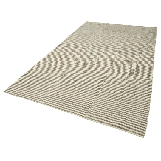 Duhon Hand-Knotted Cotton/Wool Beige Rug