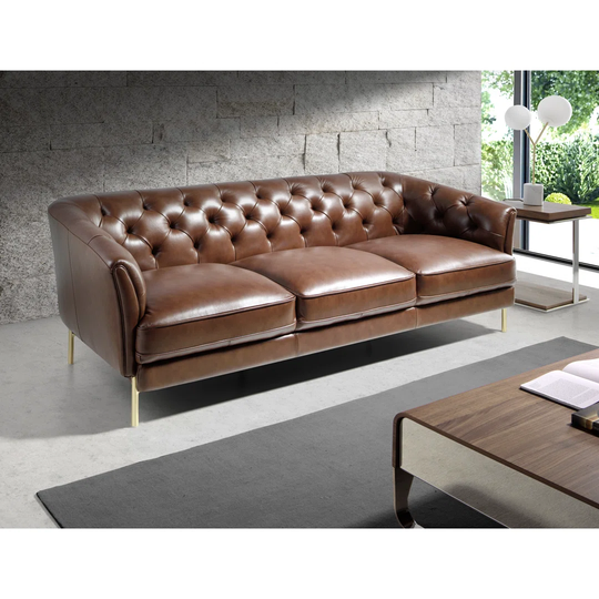 3 Seater Sofa Upholstered In Quilted Upholstery With Cowhide Leather. Leg Frame In Polished Solid Steel Legs, Golden Colour.