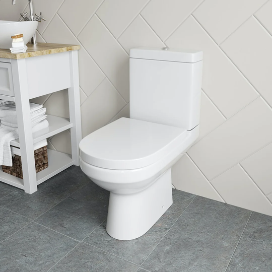 Bayer Close Coupled Toilet Button Flush and Soft Close Seat