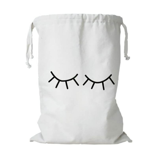 Large canvas laundry bag with drawstring to organize travel washing machine