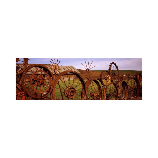 Old Barn with a Fence Made of Wheels, PAlouse, Whitman County - Wrapped Canvas Panoramic Photograph