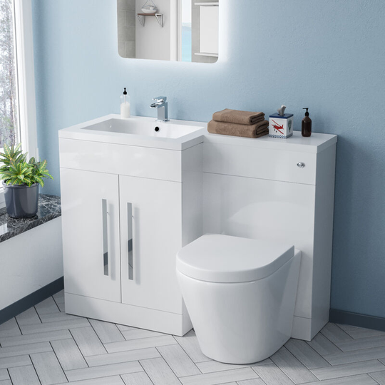 Neshome - lh Rimless Round btw Toilet, wc Unit & Resin Basin White Flat Pack | Alaska